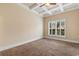 Spacious bedroom with coffered ceiling and large window offering ample natural light at 482 Pomo Dr., Myrtle Beach, SC 29579