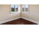 Bedroom with hardwood floors, white trim, and plantation shutters on the windows at 482 Pomo Dr., Myrtle Beach, SC 29579