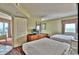 Relaxing bedroom with two beds, a dresser, and balcony access at 504 N Ocean Blvd. # 1810, Myrtle Beach, SC 29577
