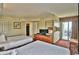 Spacious bedroom with two beds, a TV, and balcony access offering ocean views at 504 N Ocean Blvd. # 1810, Myrtle Beach, SC 29577