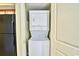Stacked washer and dryer, conveniently located near the kitchen and other appliances at 504 N Ocean Blvd. # 1810, Myrtle Beach, SC 29577