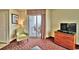 Inviting living room with balcony access offering ocean views and comfortable seating at 504 N Ocean Blvd. # 1810, Myrtle Beach, SC 29577