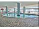 Relaxing indoor pool space with large windows offering natural light and scenic ocean views for residents at 504 N Ocean Blvd. # 1810, Myrtle Beach, SC 29577