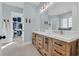 Bright bathroom featuring a double sink vanity and walk-in closet for optimal storage at 5049 Middleton View Dr., Myrtle Beach, SC 29579