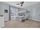 Relaxing bedroom featuring a bunk bed, a ceiling fan, and a dresser at 5049 Middleton View Dr., Myrtle Beach, SC 29579