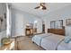 Bedroom with light blue walls, and view of the bathroom through the doorway at 5049 Middleton View Dr., Myrtle Beach, SC 29579