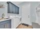 Laundry room features modern washer/dryer and ample cabinetry for storage at 5049 Middleton View Dr., Myrtle Beach, SC 29579