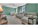 Entertainment space features a comfortable reclining sofa and a table at 5049 Middleton View Dr., Myrtle Beach, SC 29579