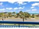 Breathtaking ocean view from the balcony, showcasing palm trees and sandy beaches at 5511 N Ocean Blvd. # 209, Myrtle Beach, SC 29577