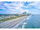 Breathtaking oceanfront view of Myrtle Beach with the pier and skyline at 5511 N Ocean Blvd. # 209, Myrtle Beach, SC 29577
