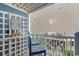 Quaint balcony with a view of the adjacent building, furnished with outdoor seating and a decorative sign at 5600 Ocean Blvd. N # A11, North Myrtle Beach, SC 29582