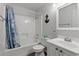Clean bathroom with a shower-tub combo, white cabinets, and nautical accents for a fresh, maritime feel at 5600 Ocean Blvd. N # A11, North Myrtle Beach, SC 29582