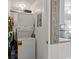 Convenient laundry room with stacked washer and dryer, maximizing space and functionality within the home at 5600 Ocean Blvd. N # A11, North Myrtle Beach, SC 29582