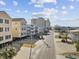 Street view of beach homes and condos, showcasing a coastal community near the ocean at 5600 Ocean Blvd. N # A11, North Myrtle Beach, SC 29582