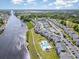 Aerial view of condo community featuring waterfront access, pool and manicured landscaping at 619 Waterway Village Blvd. # 7C, Myrtle Beach, SC 29579