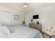 Bright bedroom featuring white walls, ceiling fan, and comfortable furnishings at 619 Waterway Village Blvd. # 7C, Myrtle Beach, SC 29579