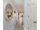 Inviting hallway with light blue walls, leading into a bright living space with views of the outdoor patio at 619 Waterway Village Blvd. # 7C, Myrtle Beach, SC 29579