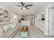 Spacious living room flows into a well-equipped kitchen area with breakfast bar at 619 Waterway Village Blvd. # 7C, Myrtle Beach, SC 29579
