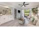 Bright, airy living room with modern decor, a ceiling fan, and sliding glass doors at 619 Waterway Village Blvd. # 7C, Myrtle Beach, SC 29579