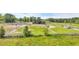Scenic view of horse farm with horses grazing in the meadow, barns, and white fencing at 6200 Adrian Pkwy., Conway, SC 29526