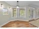 Bright dining area features many windows providing ample natural light at 675 Wedgewood Dr., Murrells Inlet, SC 29576