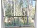 Balcony overlooks a serene wooded area at 70 Mingo Dr. # 3-E, Pawleys Island, SC 29585