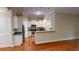 Bright kitchen featuring stainless steel appliances, granite countertops, and a convenient breakfast bar at 70 Mingo Dr. # 3-E, Pawleys Island, SC 29585
