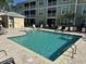 Community pool with lounge chairs at 70 Mingo Dr. # 3-E, Pawleys Island, SC 29585