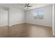 Neutral Bedroom with hardwood flooring, ceiling fan and bright window at 7005 Grant St., Little River, SC 29566