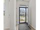 Welcoming entryway features a view through the open door of the house across the street at 7005 Grant St., Little River, SC 29566