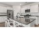 Kitchen with stainless appliances, granite countertops and an eat-in island at 7005 Grant St., Little River, SC 29566