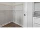 Walk-in pantry featuring white wire shelving and vinyl flooring at 7005 Grant St., Little River, SC 29566