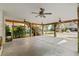 Spacious carport featuring multiple ceiling fans and natural wood support beams at 77 Weatherboard Ct., Pawleys Island, SC 29585