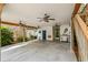 Spacious carport featuring ceiling fans and providing ample room for parking and activities at 77 Weatherboard Ct., Pawleys Island, SC 29585
