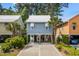 Charming raised beach house with coastal decor, ample parking, and convenient stair access at 77 Weatherboard Ct., Pawleys Island, SC 29585