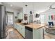 Bright kitchen with butcher block island, stainless steel appliances, and open layout at 77 Weatherboard Ct., Pawleys Island, SC 29585