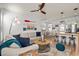 Inviting living room with plush sofa, nautical accents, and seamless flow to the kitchen at 77 Weatherboard Ct., Pawleys Island, SC 29585