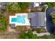 Aerial view of a house featuring a private pool and surrounded by lush greenery at 835 South Marlin Circle, Murrells Inlet, SC 29576