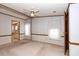 A spacious bedroom with carpeting, a ceiling fan, and neutral walls at 835 South Marlin Circle, Murrells Inlet, SC 29576
