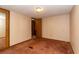 Bedroom with carpet, wallpaper, and a view of the en suite bath at 835 South Marlin Circle, Murrells Inlet, SC 29576