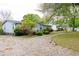 Charming single-story home featuring a well-maintained lawn and flowering bushes in a quaint neighborhood setting at 835 South Marlin Circle, Murrells Inlet, SC 29576