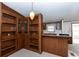 Kitchen with built-in shelves, wood bar and cabinets at 835 South Marlin Circle, Murrells Inlet, SC 29576