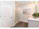 Well-lit bathroom with a glass-enclosed shower, modern vanity, and neutral decor at 882 Farmers Passage Loop, Loris, SC 29569