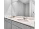 Elegant bathroom featuring a double sink vanity with chrome fixtures and a large mirror at 977 Cherrystone Loop, Conway, SC 29526