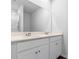 Bathroom featuring double vanity, countertop, large mirror, and glass enclosed shower at 977 Cherrystone Loop, Conway, SC 29526