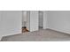 Neutral bedroom featuring plush carpeting, with an open doorway to a walk-in closet and bath at 977 Cherrystone Loop, Conway, SC 29526