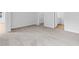 Bright bedroom featuring neutral carpet, closet, and attached bathroom at 977 Cherrystone Loop, Conway, SC 29526