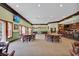 Spacious dining area with ample seating, bar, and picturesque window views at 977 Cherrystone Loop, Conway, SC 29526