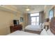 Cozy bedroom featuring two double beds, a TV, and access to a balcony with scenic views at 100 North Beach Blvd. # 1801, North Myrtle Beach, SC 29582