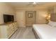 Bedroom with neutral carpet, a dresser, and a king bed at 100 North Beach Blvd. # 1801, North Myrtle Beach, SC 29582